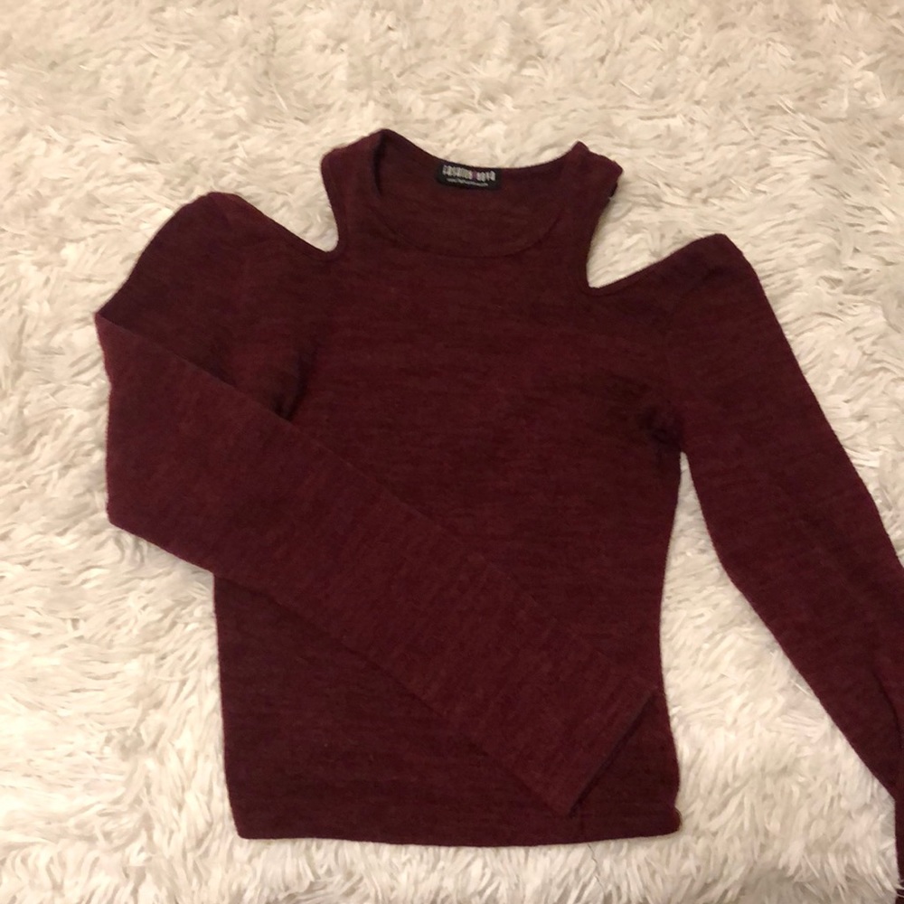Long sleeve and also shows shoulders.